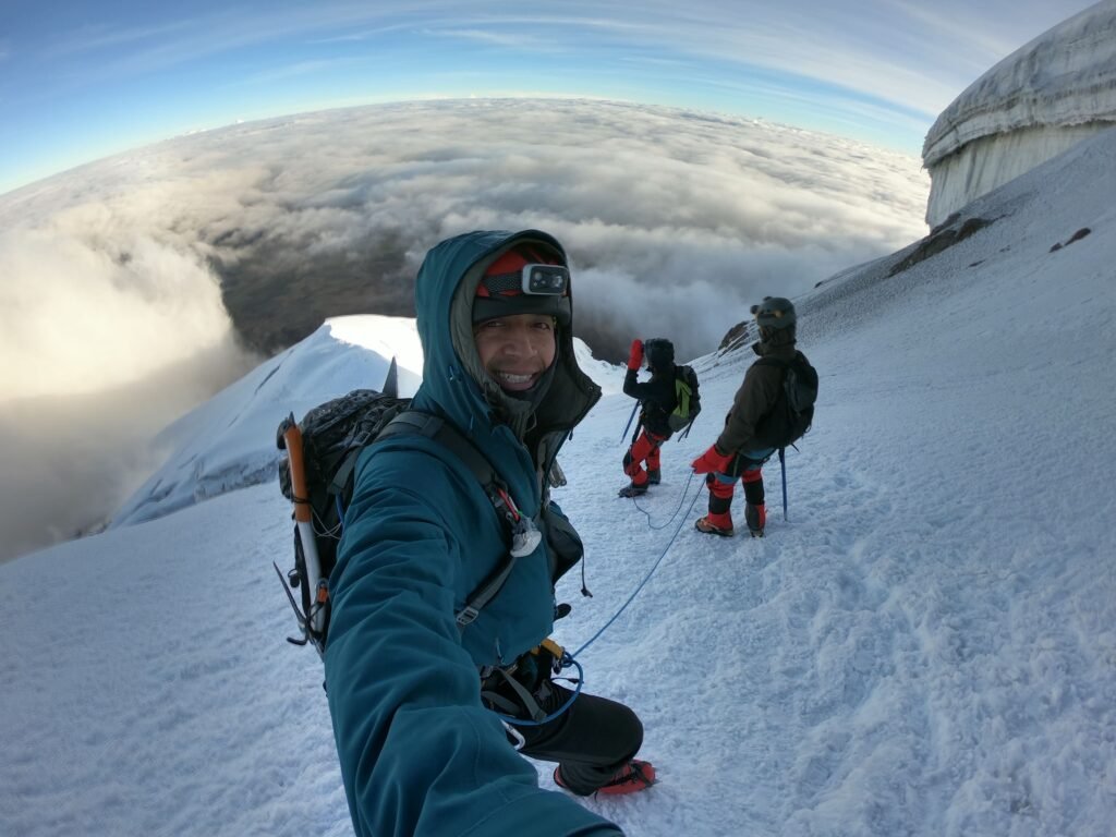 Glacier climb on Cotopaxi near the summit with guided team